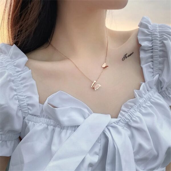 Collar mariposa doble - Imagen 2